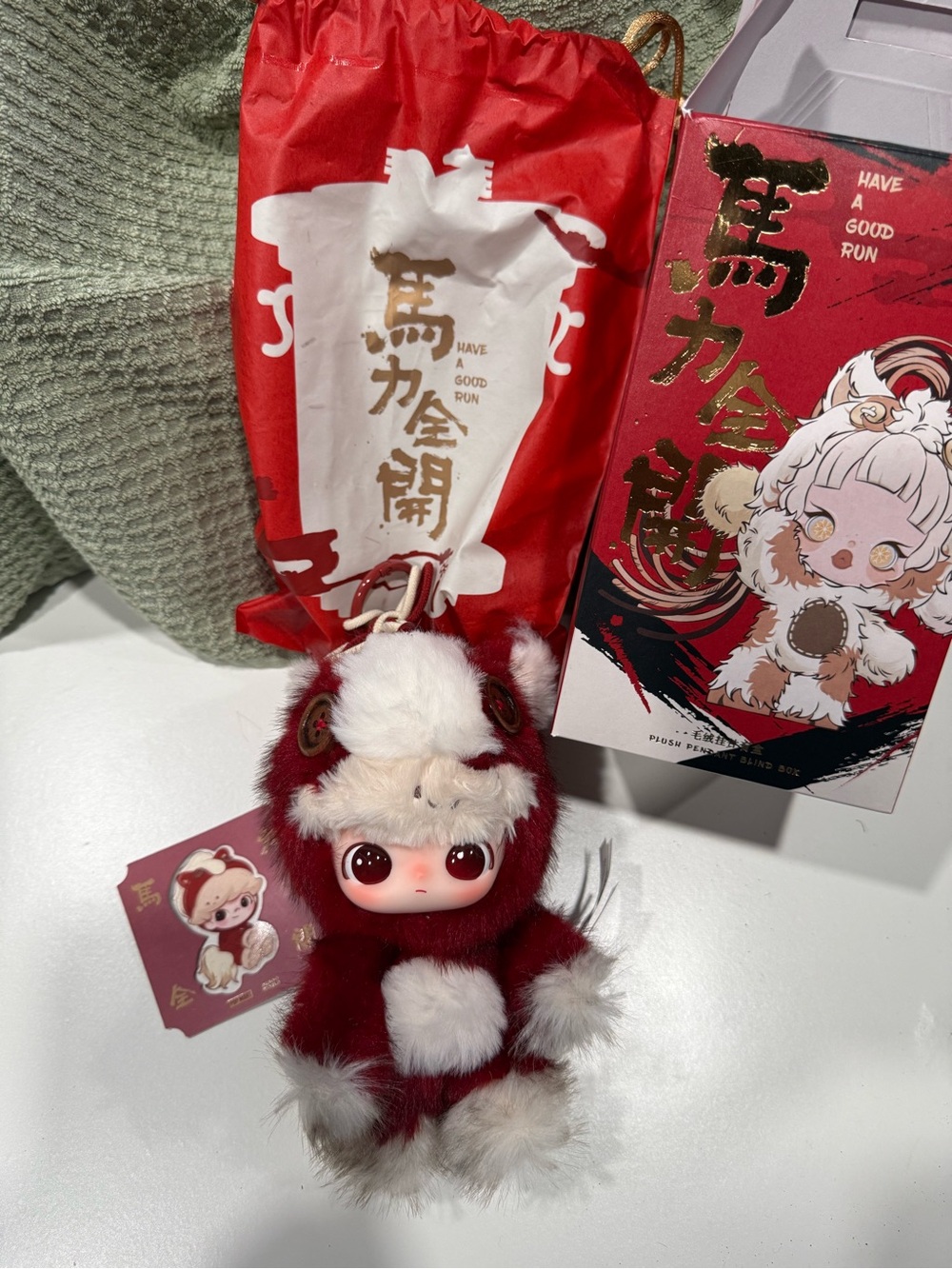 Red and White Plush Doll Keychain - Cute Character Charm Dimoo